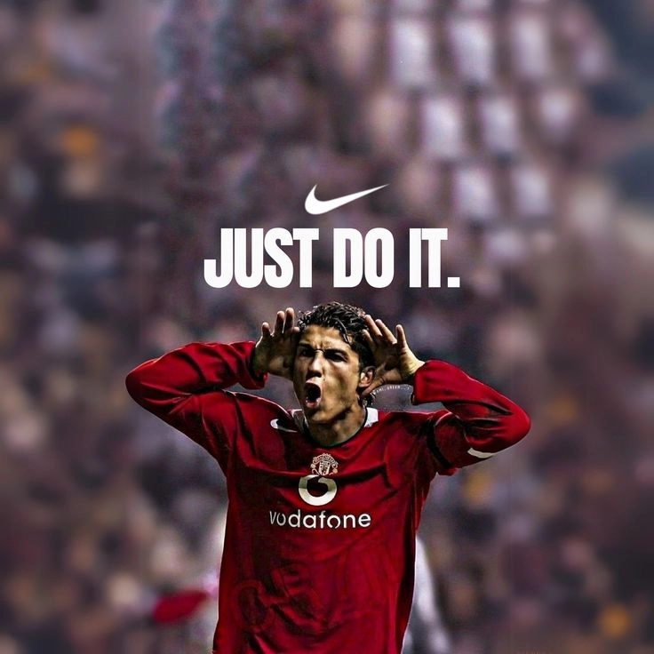 Cristiano Ronaldo wearing a red Manchester United jersey with hands near his face, featured under a Nike swoosh logo and the tagline "JUST DO IT."